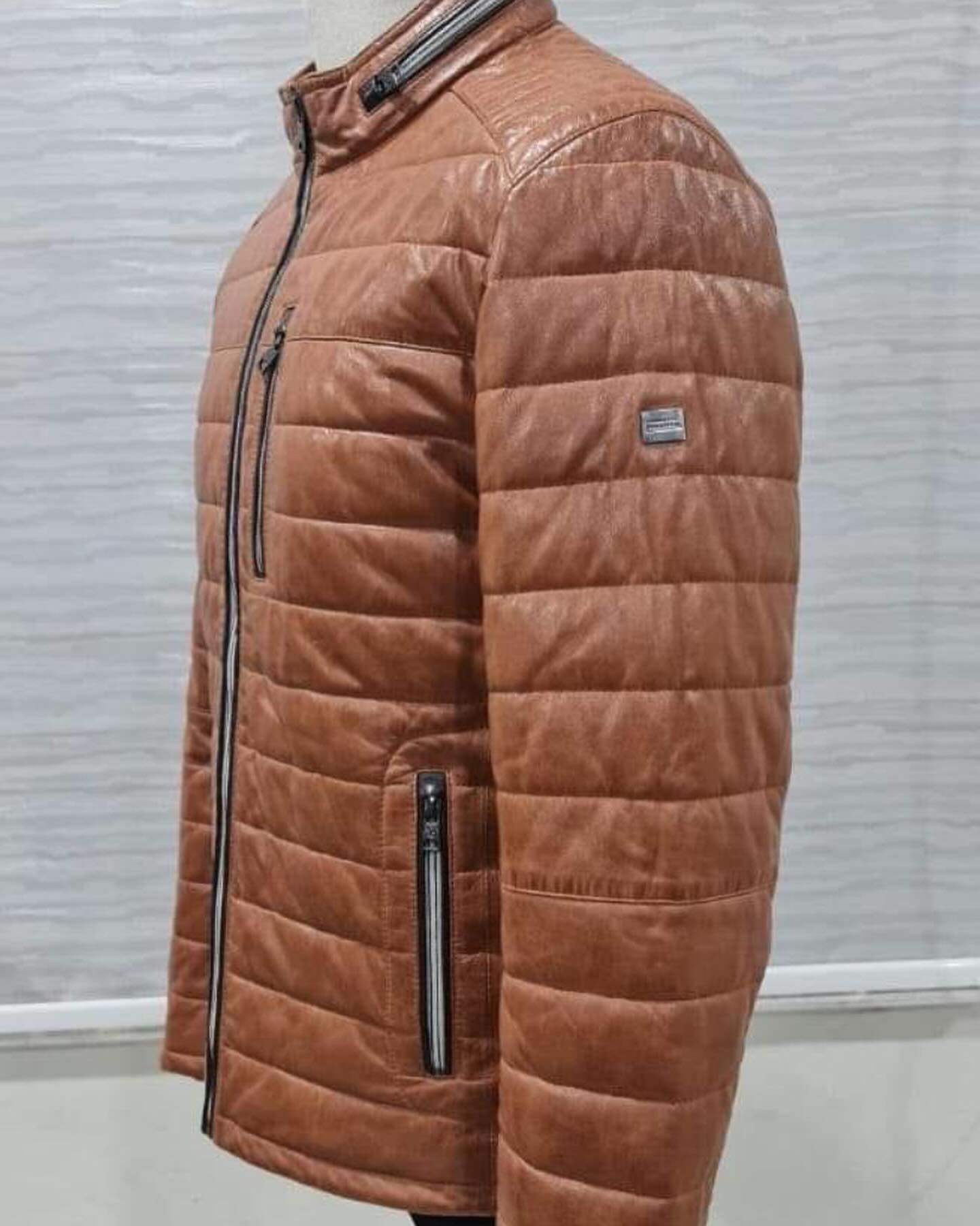 Genuine leather down jacket with press buttoned mandarin Collar