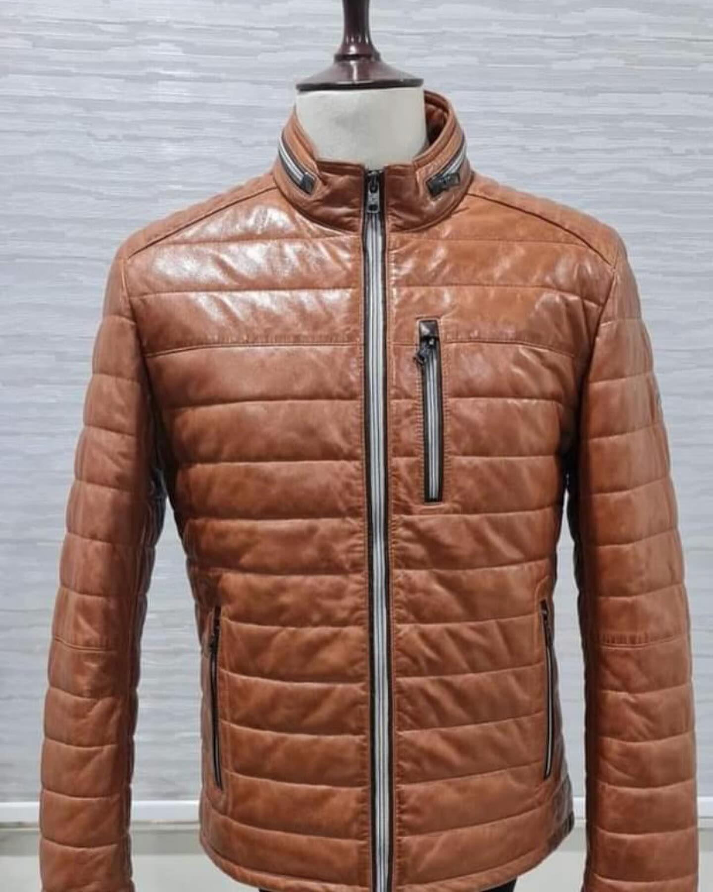 Genuine leather down jacket with press buttoned mandarin Collar